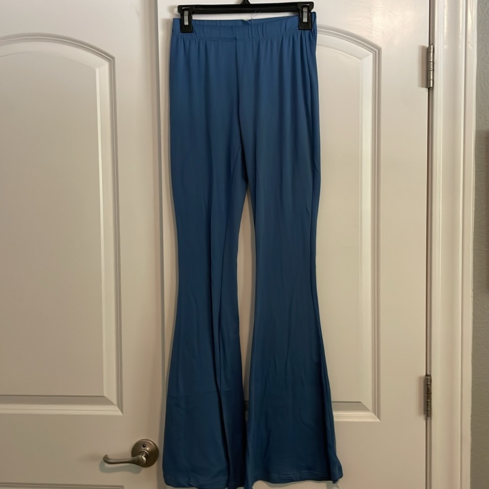 Bundle Of 4 Stretchy Flared Pants Size Small - image 3